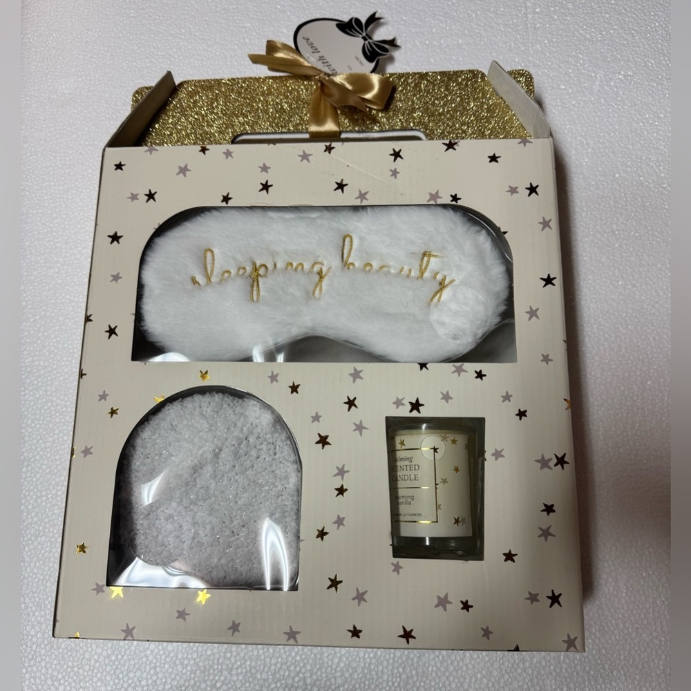 Tri-Coastal Design
Sleep Mask, Cozy Socks, And Candle Gift Set